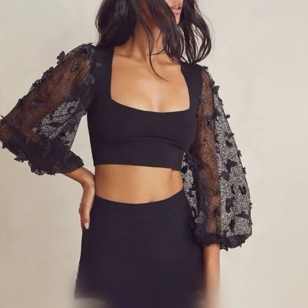 Free People flutter butterfly black top. NWT